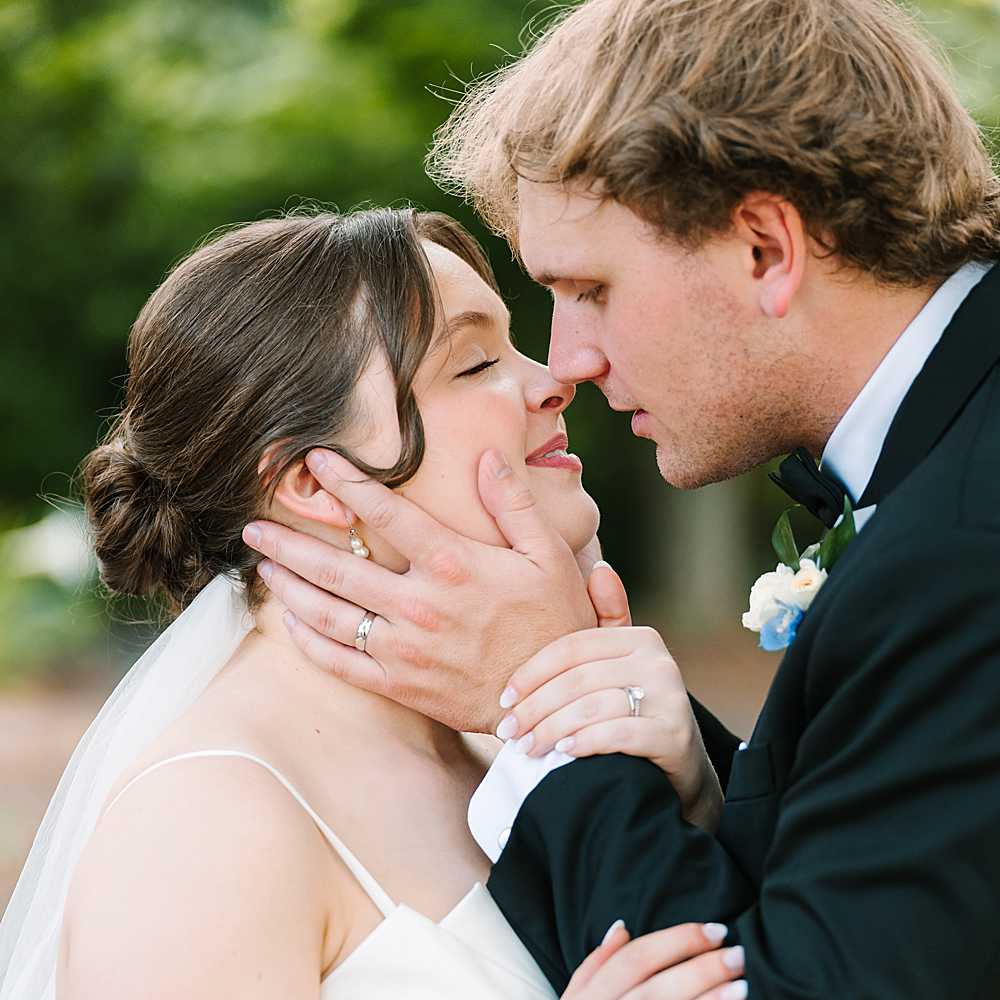 bride and groom hold each other a country club wedding in North Carolina